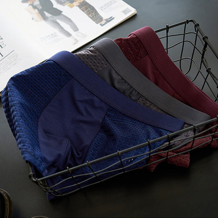 "Herrunderkläder med andningsfunktion, grå boxers i mjukt material, mellanhög midja för optimal komfort och passform."