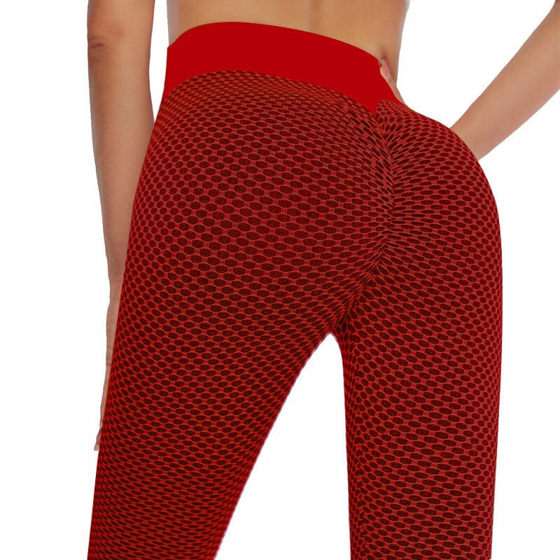 Högmidjade dam yoga leggings med rumplyft effekt och brett midjeband, i grå färg, för komfort och stil vid träning.