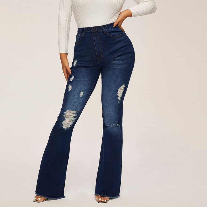 "Högmidjade damjeans med utsvängda ben och slitna detaljer, trendig siluett för moderiktig stil och komfort."
