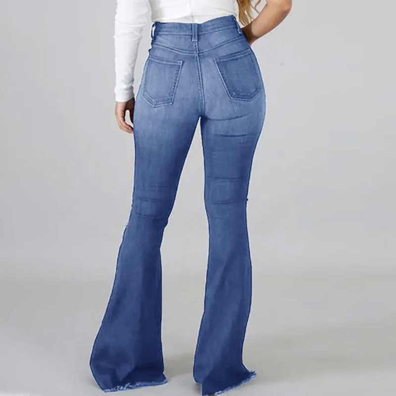 "Högmidjade damjeans med utsvängda ben och slitna detaljer, trendig siluett för moderiktig stil och komfort."