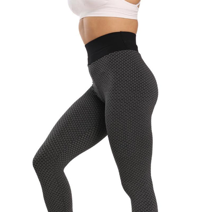"Högmidjade push-up sportigt yoga leggings för kvinnor, ankel-längd, svart färg för perfekt passform och stil."