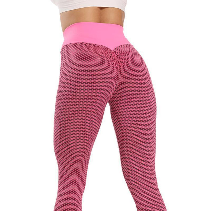 "Högmidjade push-up sportigt yoga leggings för kvinnor, ankel-längd, svart färg för perfekt passform och stil."