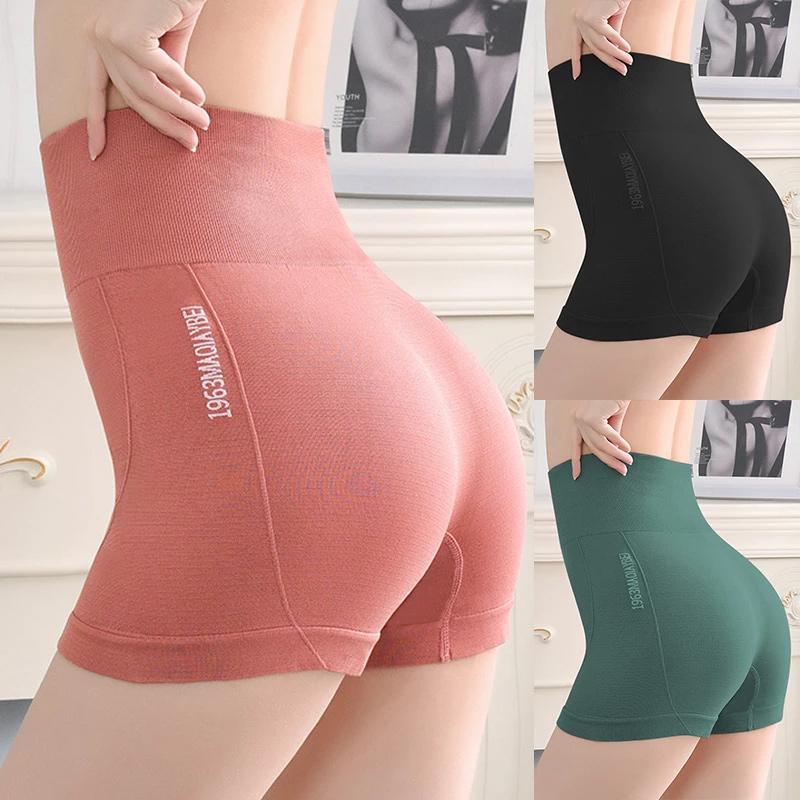 "Högmidjade sömlösa hotpants för kvinnor, bekväm passform i stilren grön färg, lyftande effekt och figurformning."