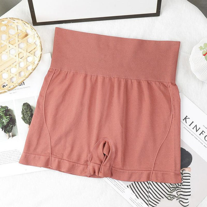 "Högmidjade sömlösa hotpants för kvinnor, bekväm passform i stilren grön färg, lyftande effekt och figurformning."