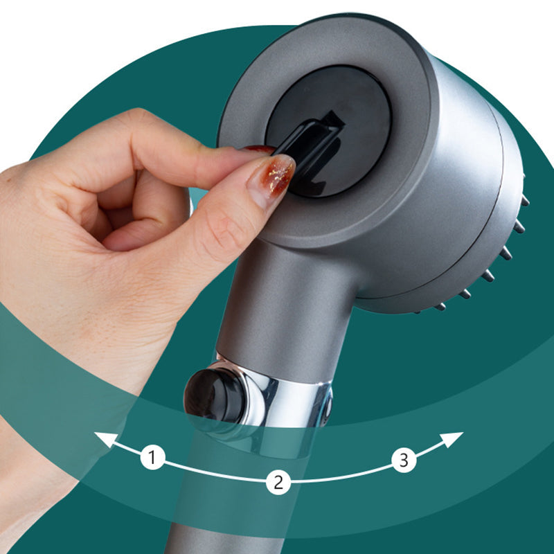 Högtrycksduschhuvud i grå ABS, tre lägen, modern design, kompakt och hållbart. Front view, liknar en hårtork.