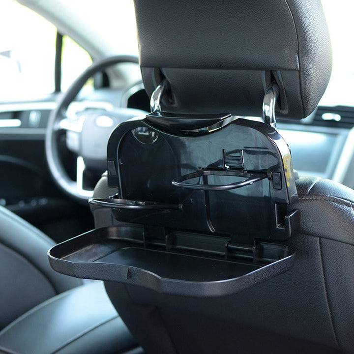 "Hopfällbar bilbricka för baksätet med förvaring och ställ i svart ABS-plast, perfekt för mat och multitasking i bilen."
