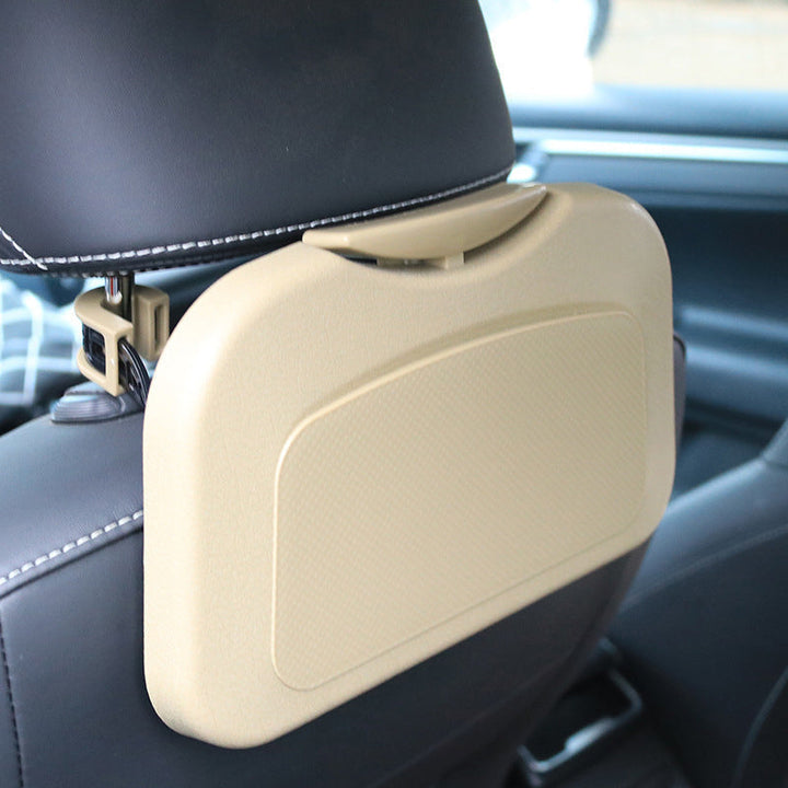 "Hopfällbar bilbricka för baksätet med förvaring och ställ i svart ABS-plast, perfekt för mat och multitasking i bilen."