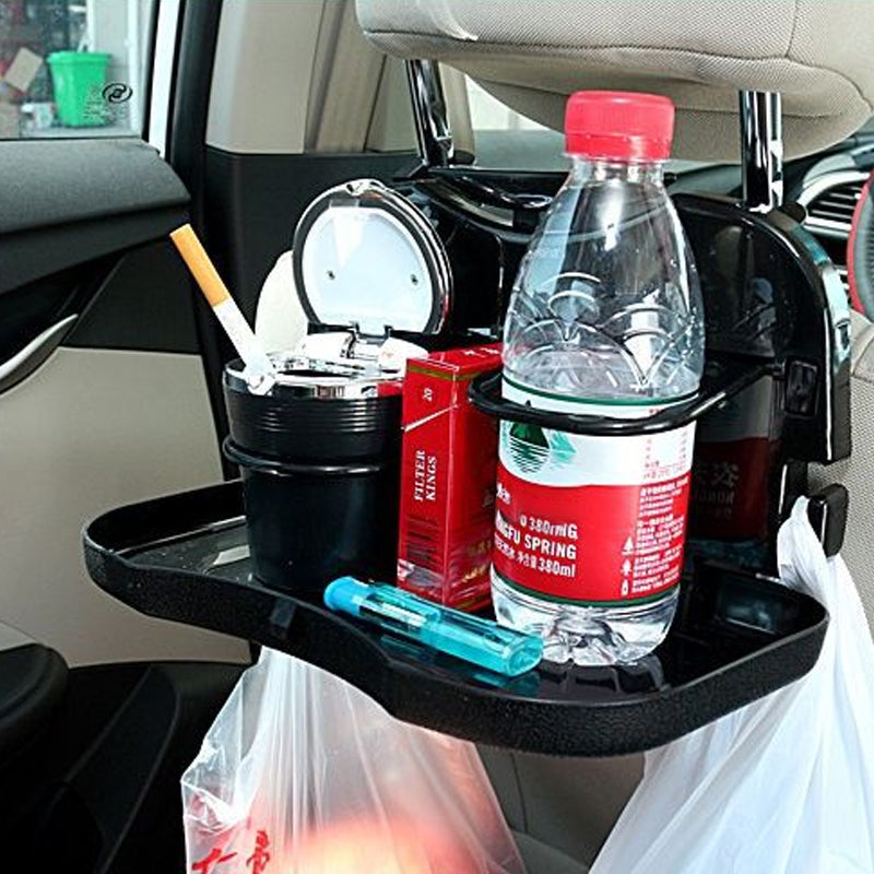 "Hopfällbar bilbricka för baksätet med förvaring och ställ i svart ABS-plast, perfekt för mat och multitasking i bilen."