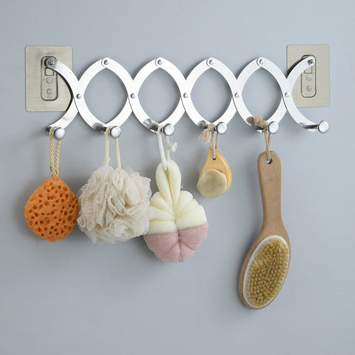 "Hopfällbar klädhängare i rostfritt stål, justerbara krokar, över dörr, silver, eleganta och kompakta designfunktioner."