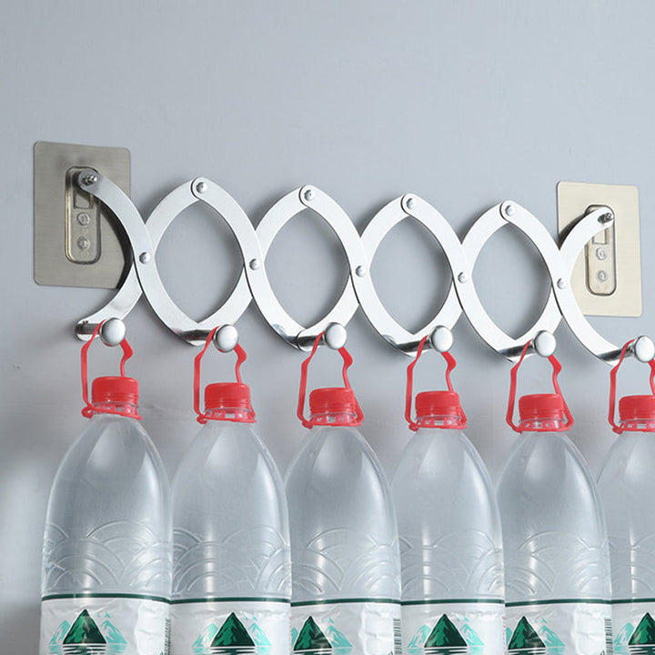 "Hopfällbar klädhängare i rostfritt stål, justerbara krokar, över dörr, silver, eleganta och kompakta designfunktioner."