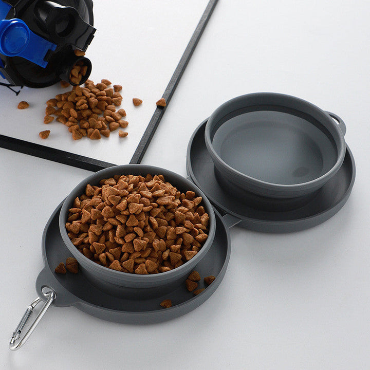 "Hopfällbar silikon matset för husdjur i blått, lätt att transportera med integrerade skålar för mat och vatten."