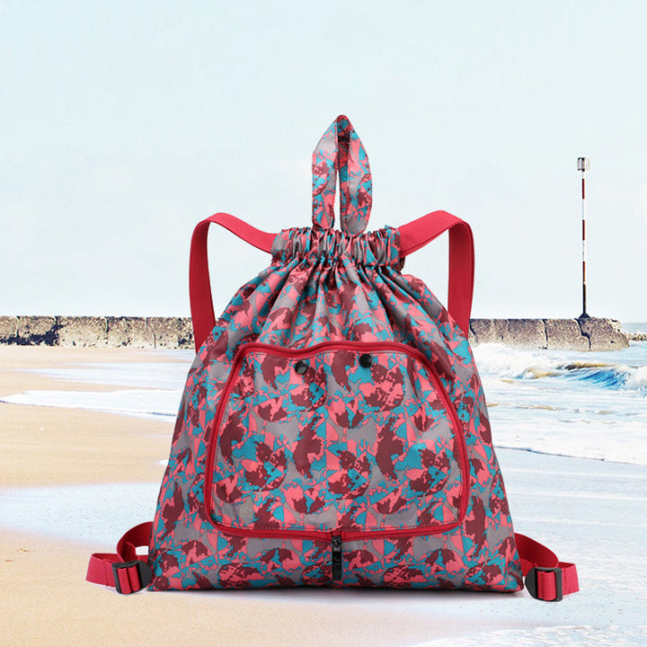 "Hopvikbar unisex ryggsäck med dragsko, vattentät yta, lättviktig och kompakt design, lämplig för både stad och äventyr."