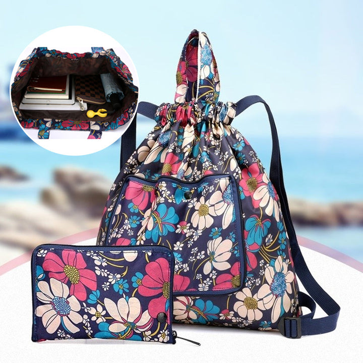 "Hopvikbar unisex ryggsäck med dragsko, vattentät yta, lättviktig och kompakt design, lämplig för både stad och äventyr."