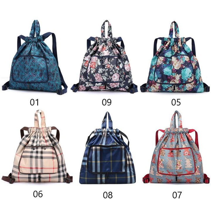 "Hopvikbar unisex ryggsäck med dragsko, vattentät yta, lättviktig och kompakt design, lämplig för både stad och äventyr."