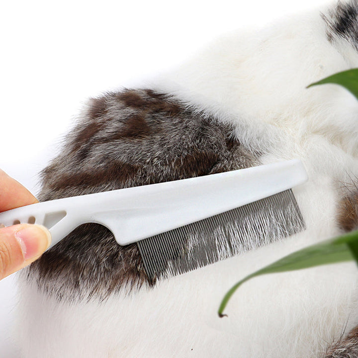 "Husdjurs nålkam för hundar och katter, rostfritt stål, ergonomiskt grepp och roterande nålar i flera färger"