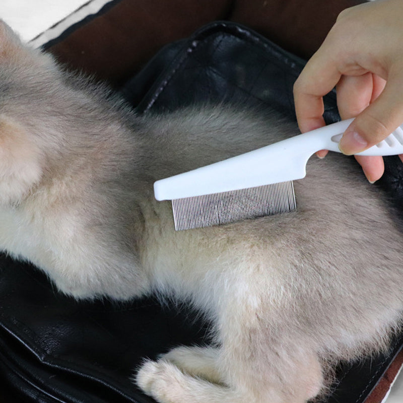 "Husdjurs nålkam för hundar och katter, rostfritt stål, ergonomiskt grepp och roterande nålar i flera färger"