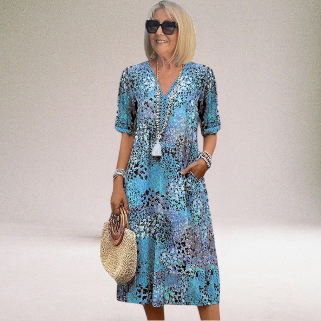 Elegant Ida damklänning med V-ringning, perfekt sommarklänning för fest & vardag.