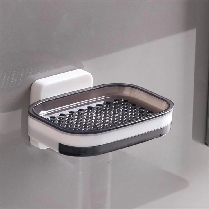 Elegant tvålkopp med avtappningsbricka i svart och grå