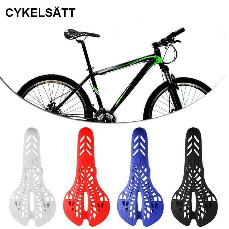 "Inbyggd cykelsadel i svart med andningsbar design och 69 ventilationshål för ökad komfort och minskad svettning."