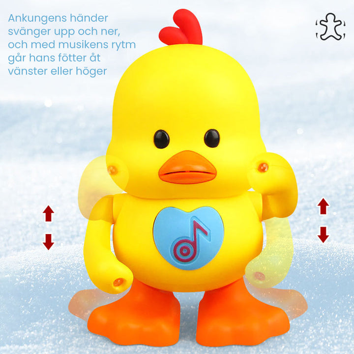 "Interaktiv dansande anka för barn med ljuseffekter, rörliga armar och ben, i ljus plast, perfekt leksak för rytmisk lek."