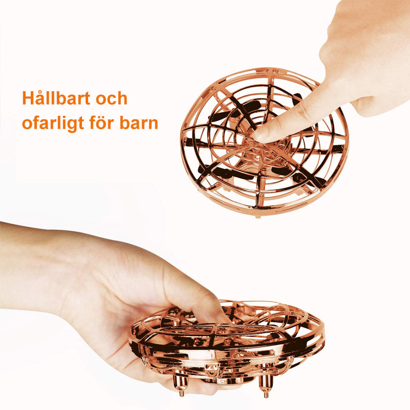"Interaktiv Mini UFO leksak med färgglada LED-ljus, flygande manövrer och gestkontroll, perfekt för nattlek."