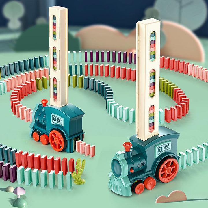 Interaktivt domino tåg med färgglada byggblock för barn, främjar kreativ lek och lärande genom ett automatiskt läggsystem.