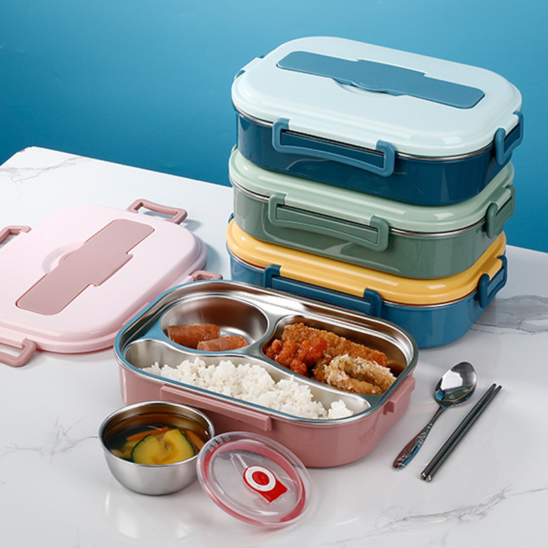"Isolerad Bentobox i rostfritt stål med fyra fack för hållbar matförvaring. Smidig design i färgglada alternativ."