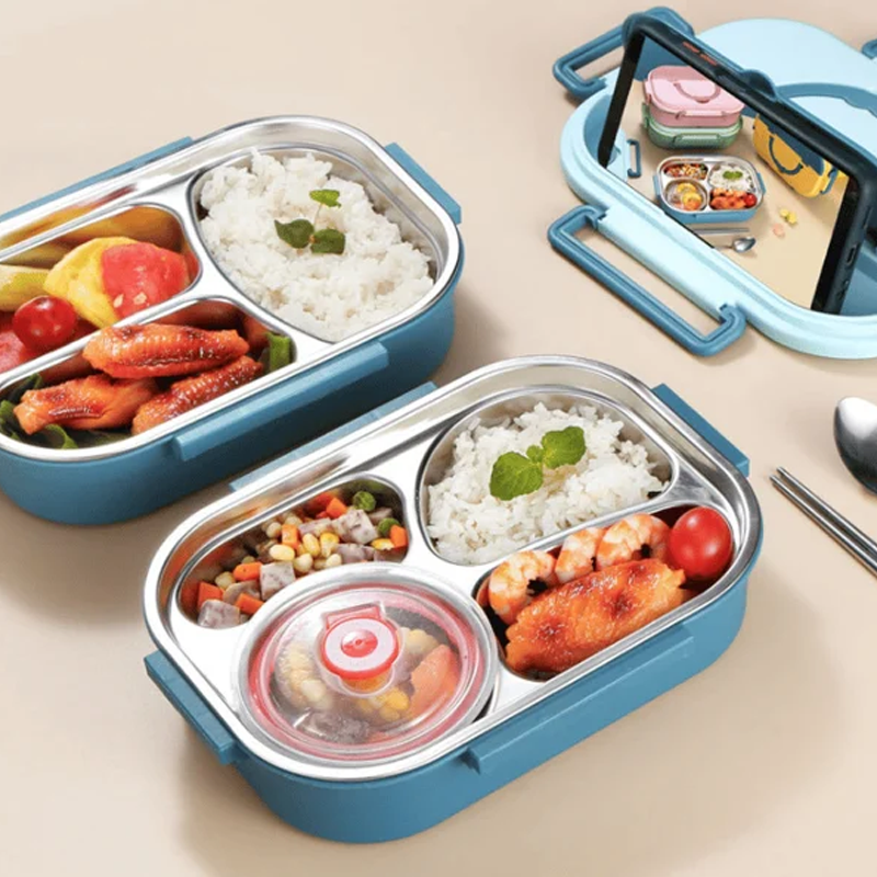 "Isolerad Bentobox i rostfritt stål med fyra fack för hållbar matförvaring. Smidig design i färgglada alternativ."