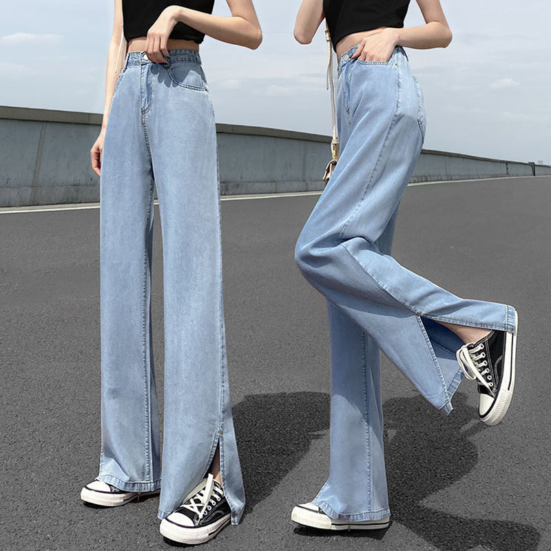 "Jeans med vida ben för kvinnor i blått lyocellmaterial med hög midja och raka ben, ger en smickrande och bekväm stil."
