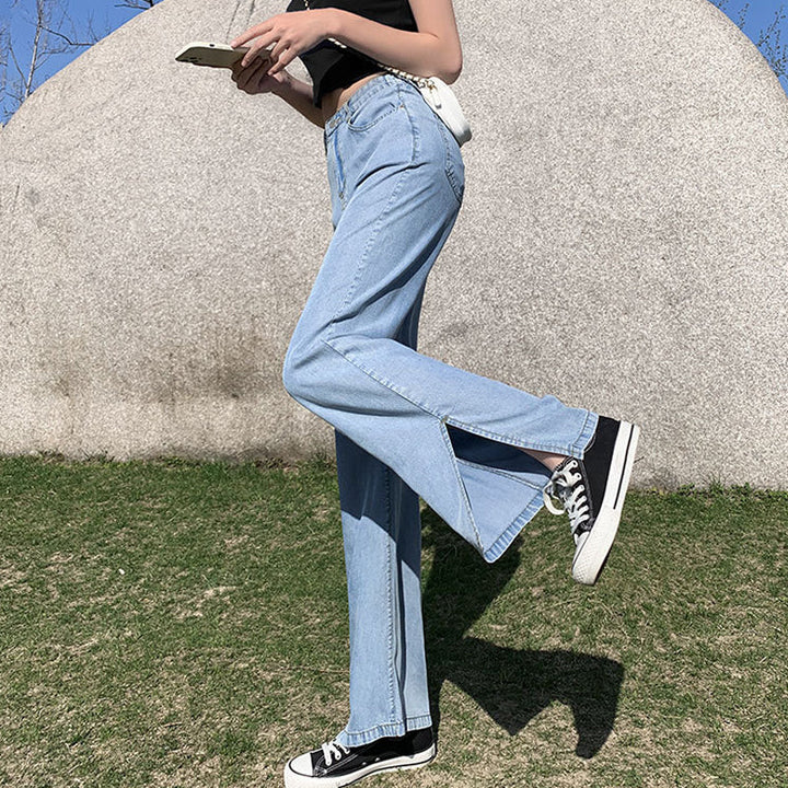 "Jeans med vida ben för kvinnor i blått lyocellmaterial med hög midja och raka ben, ger en smickrande och bekväm stil."