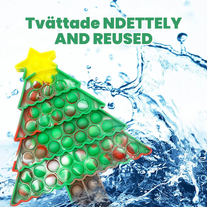 "Jul Fidget leksak med bubblor, silikonmaterial, julgran och tomte motiv, rolig sensorisk stressavlastare för barn."