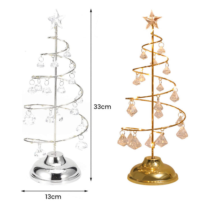 "Jul LED bordslampa i kristallform som lyser i varmt guld eller silvervitt, elegant dekoration för festlig atmosfär."