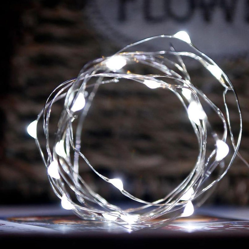 "Jul ljusslinga med koppartråd, USB-kontroll och stjärndice effekter, perfekt för vinterdekoration och feststämning."