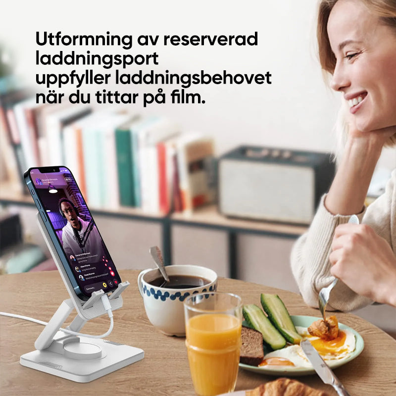 Justerbar 360° rotationshållare i metall med halksäkra kuddar för telefon/surfplatta, elegant och kompakt design.