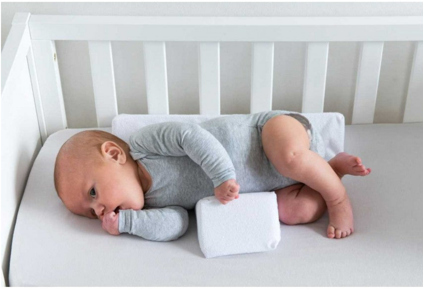 Praktisk justerbar babytillbehör: antirull kudde för säker sidosömn hos nyfödda.