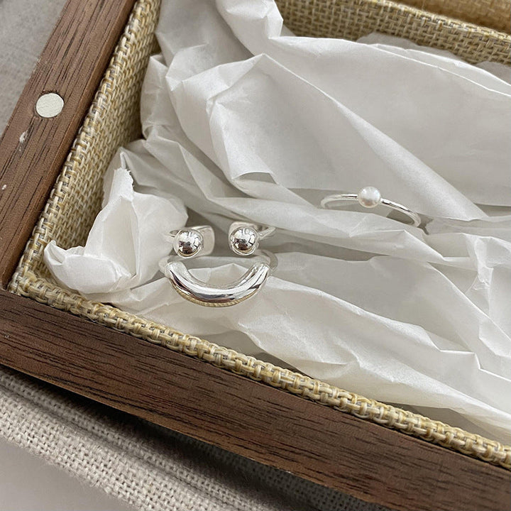 Justerbar damer leende emoji ring i koppar, stilfull design med glansig finish, perfekt för att komplettera din look.