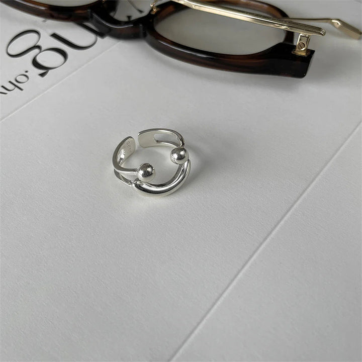 Justerbar damer leende emoji ring i koppar, stilfull design med glansig finish, perfekt för att komplettera din look.