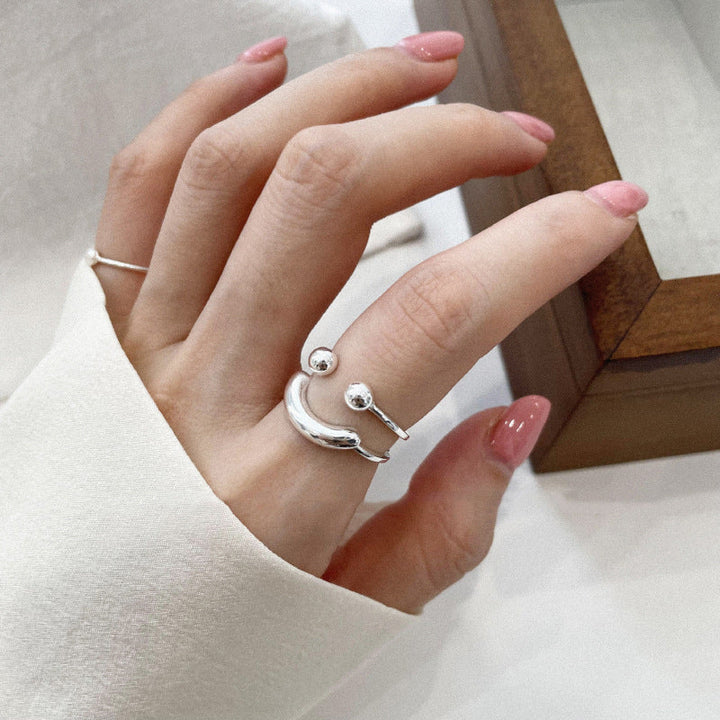 Justerbar damer leende emoji ring i koppar, stilfull design med glansig finish, perfekt för att komplettera din look.
