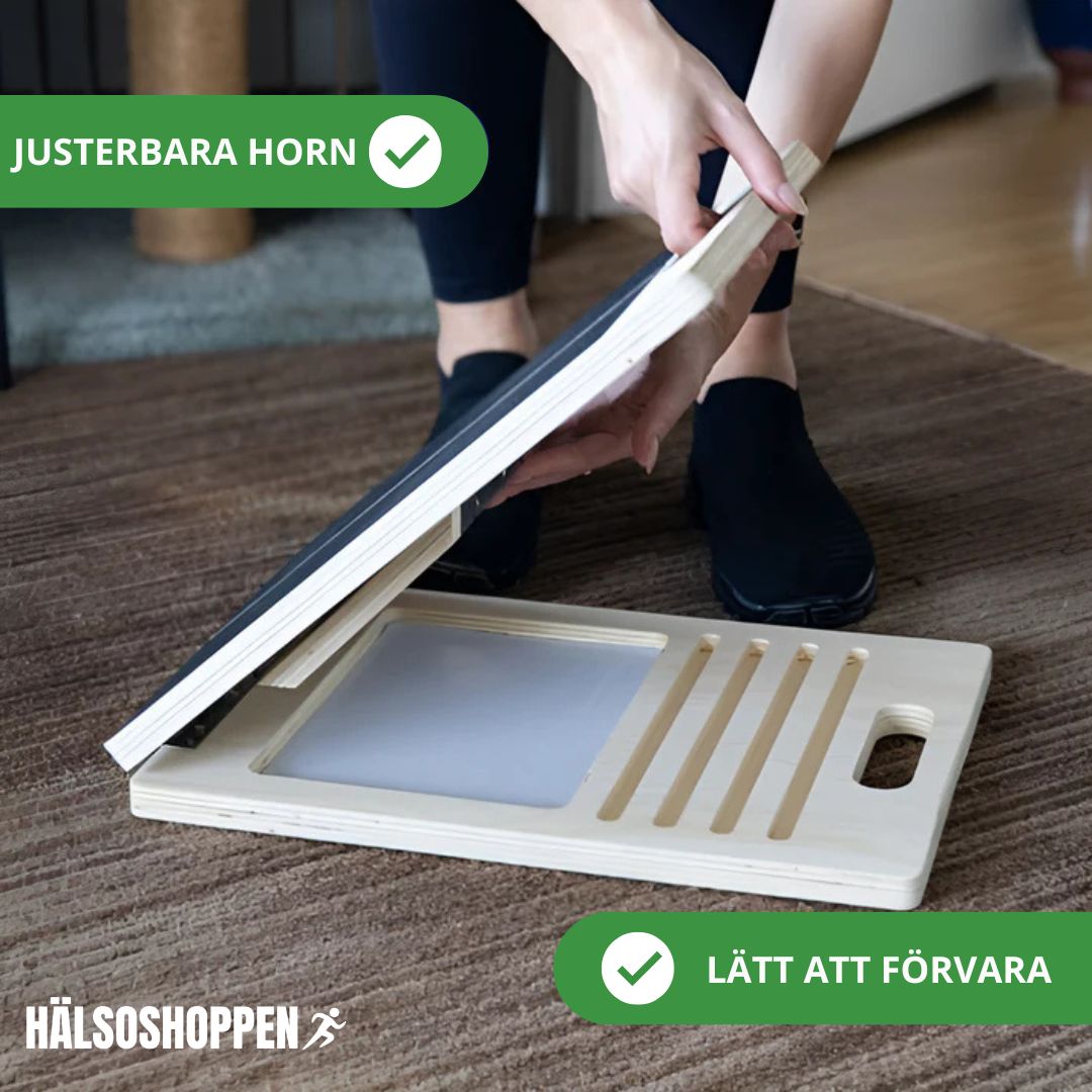 Trä stretchbräda med justerbar lutning för flexibilitet och balans, idealisk för stretching och träning.