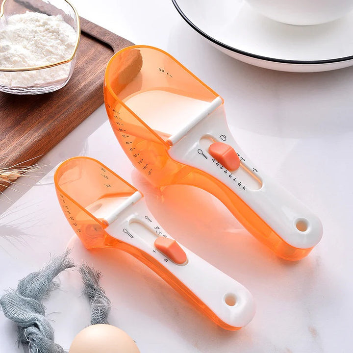 "Justerbar måttsked för kök med ergonomisk design och grön färg, perfekt för exakt mätning i matlagning och bakning."