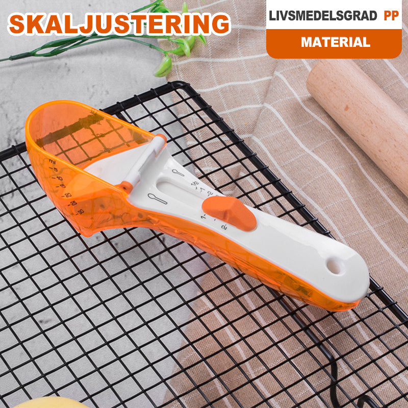"Justerbar måttsked för kök med ergonomisk design och grön färg, perfekt för exakt mätning i matlagning och bakning."