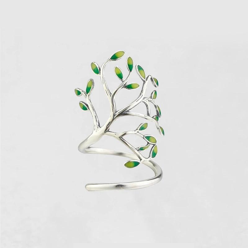 Justerbar olivträd ring i silver med gröna blad, damaccessoar som symboliserar fred och skönhet.
