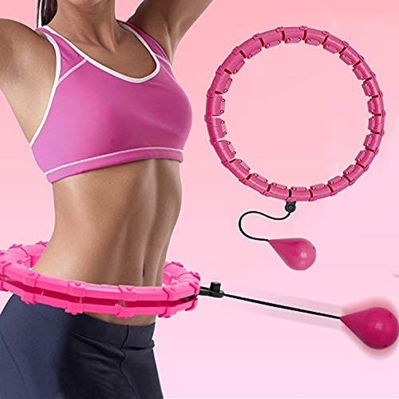 "Justerbar rosa och lila hula hoop i plast, 24 sektioner, för effektiv hemmaträning mot kaloriförbränning."
