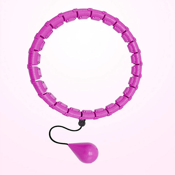 "Justerbar rosa och lila hula hoop i plast, 24 sektioner, för effektiv hemmaträning mot kaloriförbränning."