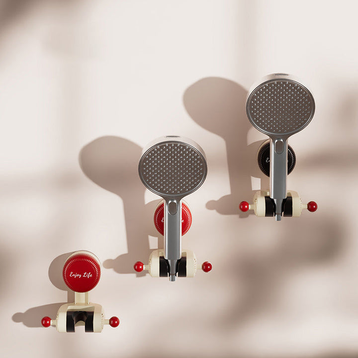 "Justerbar roterande duschhållare, vit, med sugkopp för enkla, verktygsfria installationer på släta ytor i badrummet."