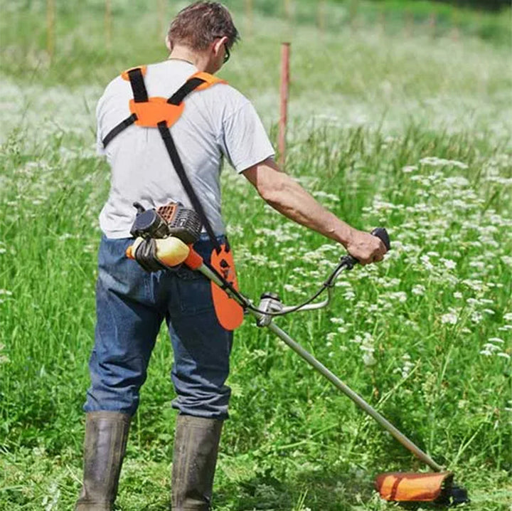 "Justerbar trimmer axelrem i svart vadderad nylon för trädgårdsarbete, avlastar axlar effektivt för bekväm användning."