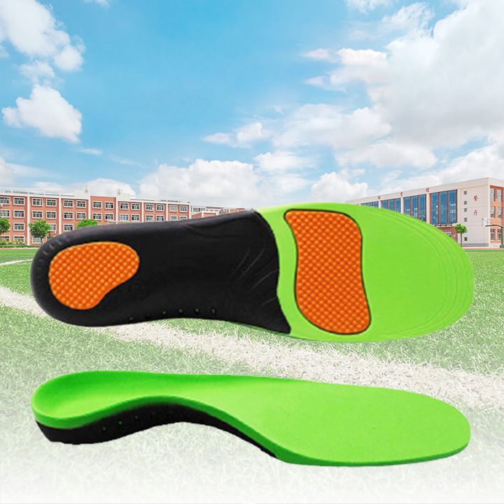 Justerbara ortotiska innersulor, svart med gul detalj, tillverkade av PU och GEL för överlägset stöd och komfort.