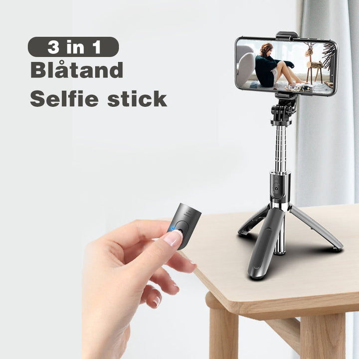 Justerbart Bluetooth selfie-stick och stativ, silver, kompakt design, inbyggd fjärrkontroll, för fotografering och resor.