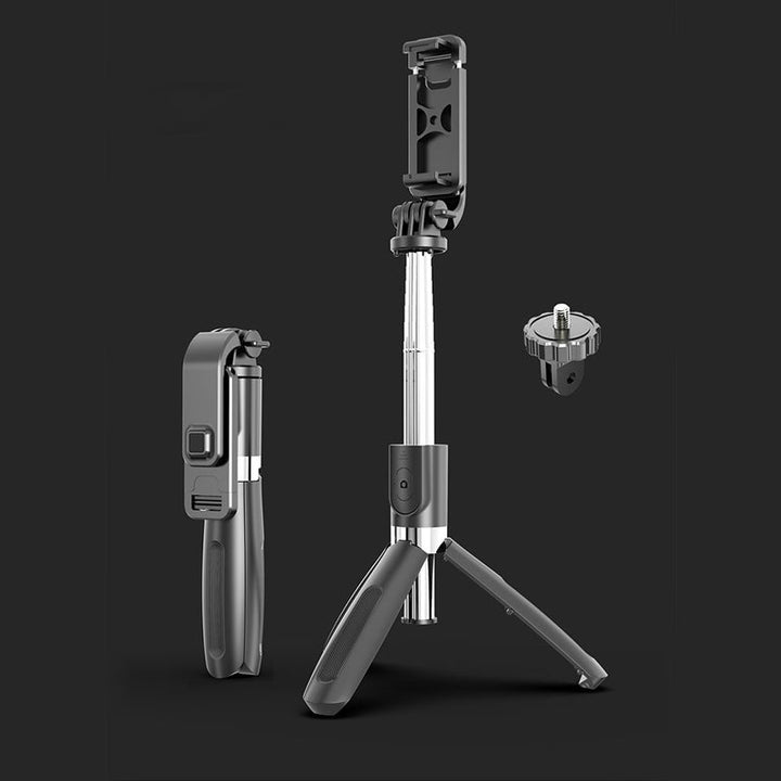 Justerbart Bluetooth selfie-stick och stativ, silver, kompakt design, inbyggd fjärrkontroll, för fotografering och resor.