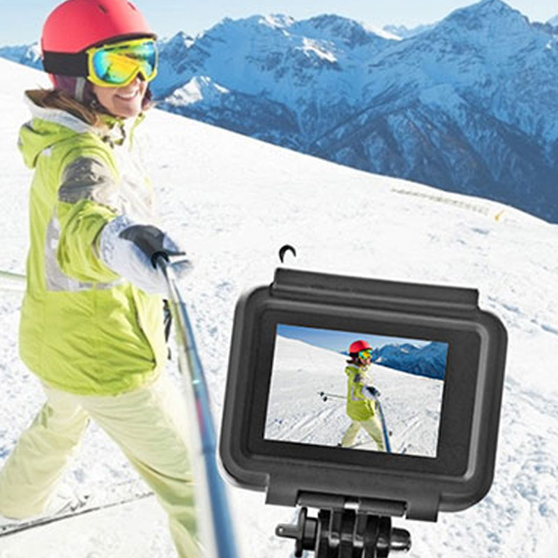 Justerbart Bluetooth selfie-stick och stativ, silver, kompakt design, inbyggd fjärrkontroll, för fotografering och resor.